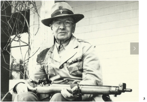 Alexander Parnell poses with his rifle in 1956. He has just earned, at age 75, a place on the  Canadian rifle shooting team, setting a record for oldest team member that has yet to be broken. 
