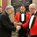 Romeo Dallaire receiving plaque from the RSM