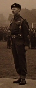 RSM Mitchell on parade in 1943 wearing battle dress and bullion capbadge