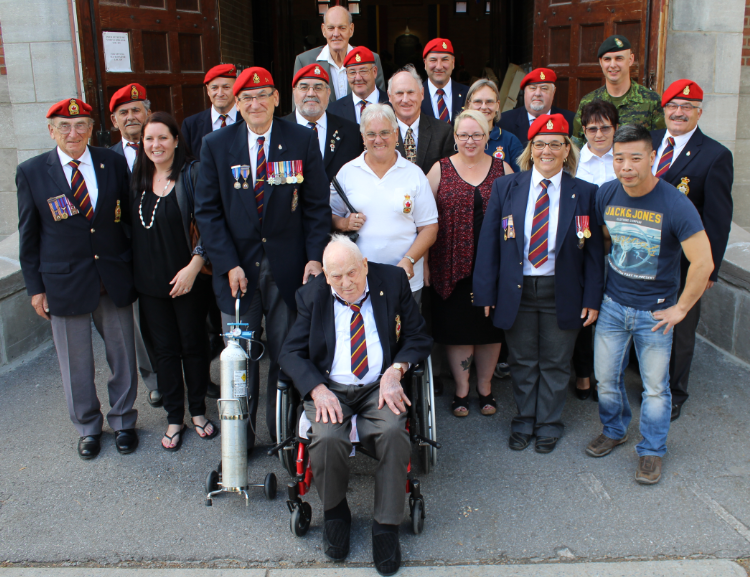 Comrades and friends of RMR Assocation (Br. 14) pose with Comrade Mann in front of the Regimental armoury in September 2016. (Photo credit: Corporal Yeung, RMR)